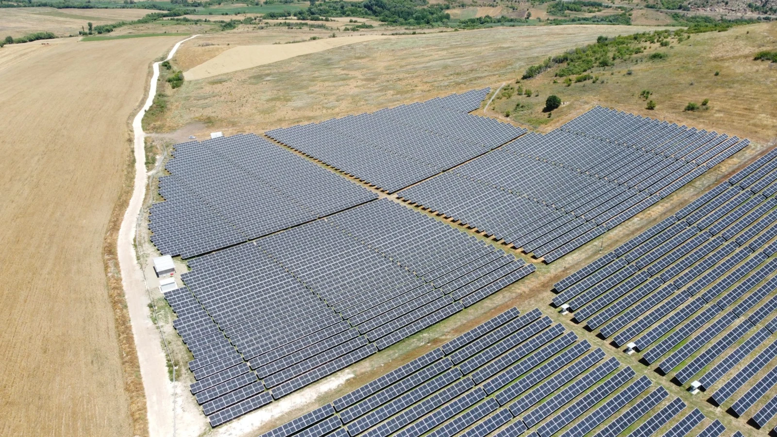 Aerial view of ground-mounted photovoltaic arrays in Macedonia